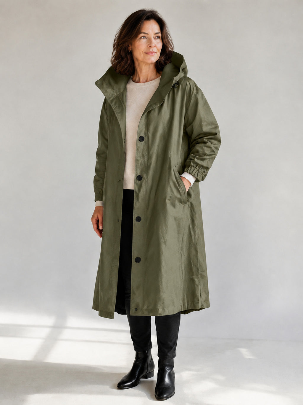 Theodora Hooded Longline Trench Coat in Olive on a 40+ model