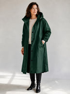 Theodora Hooded Longline Trench Coat in Forest Green on a 40+ model