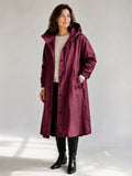 Theodora Hooded Longline Trench Coat in Wine on a 40+ model