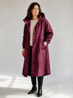 Theodora Hooded Longline Trench Coat in Wine on a 40+ model