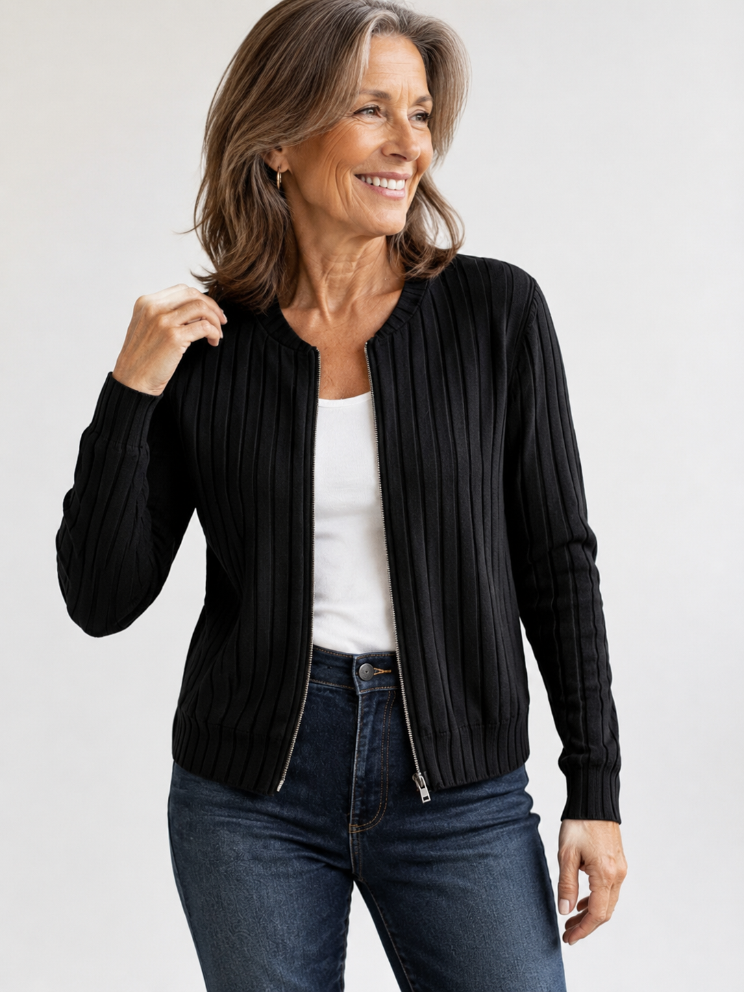 Adeline soft ribbed zip-front knit jacket in Black, elegant 60-year-old model