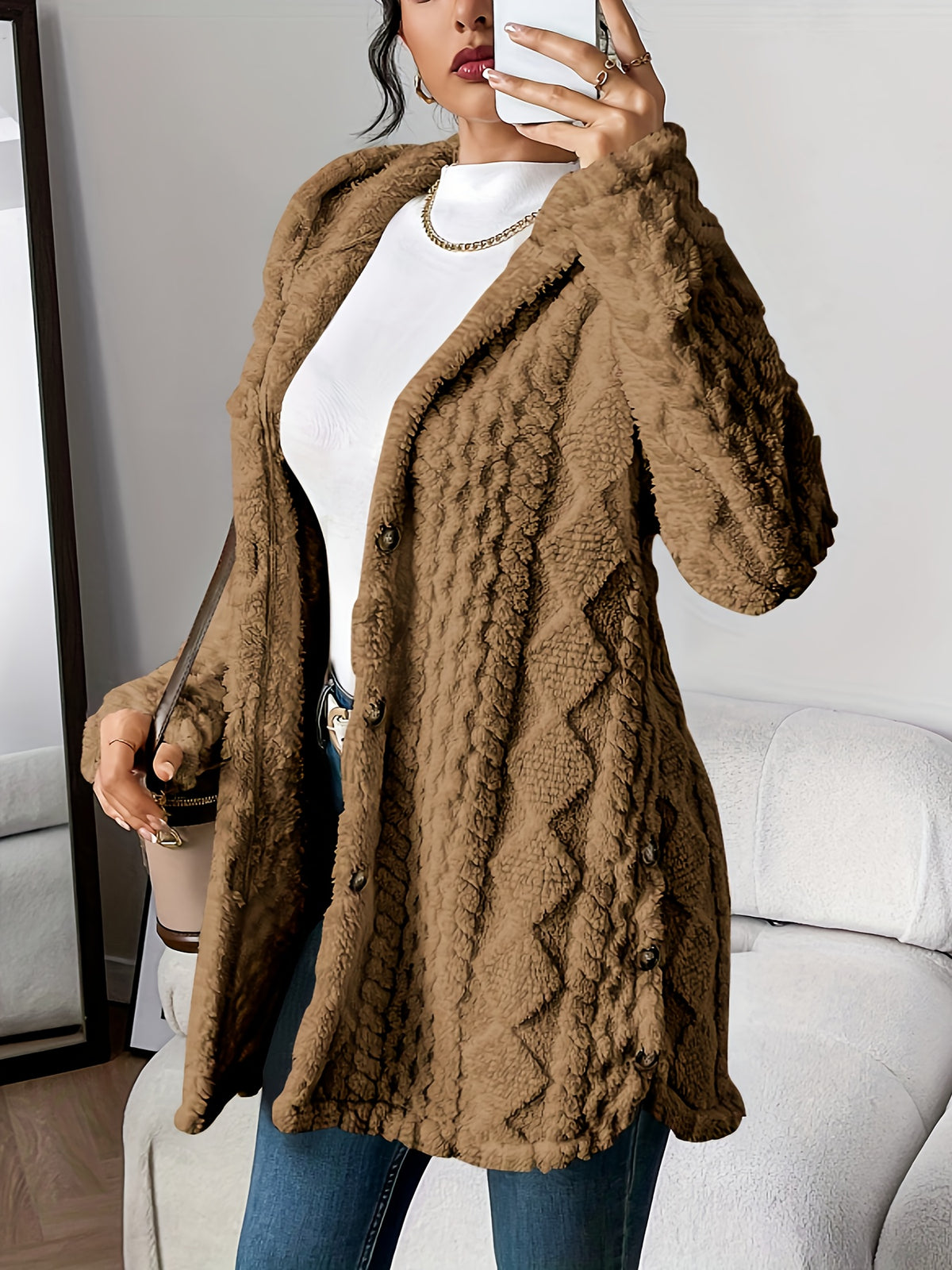 Cora plush hooded longline cardigan in brown, worn open over a white top