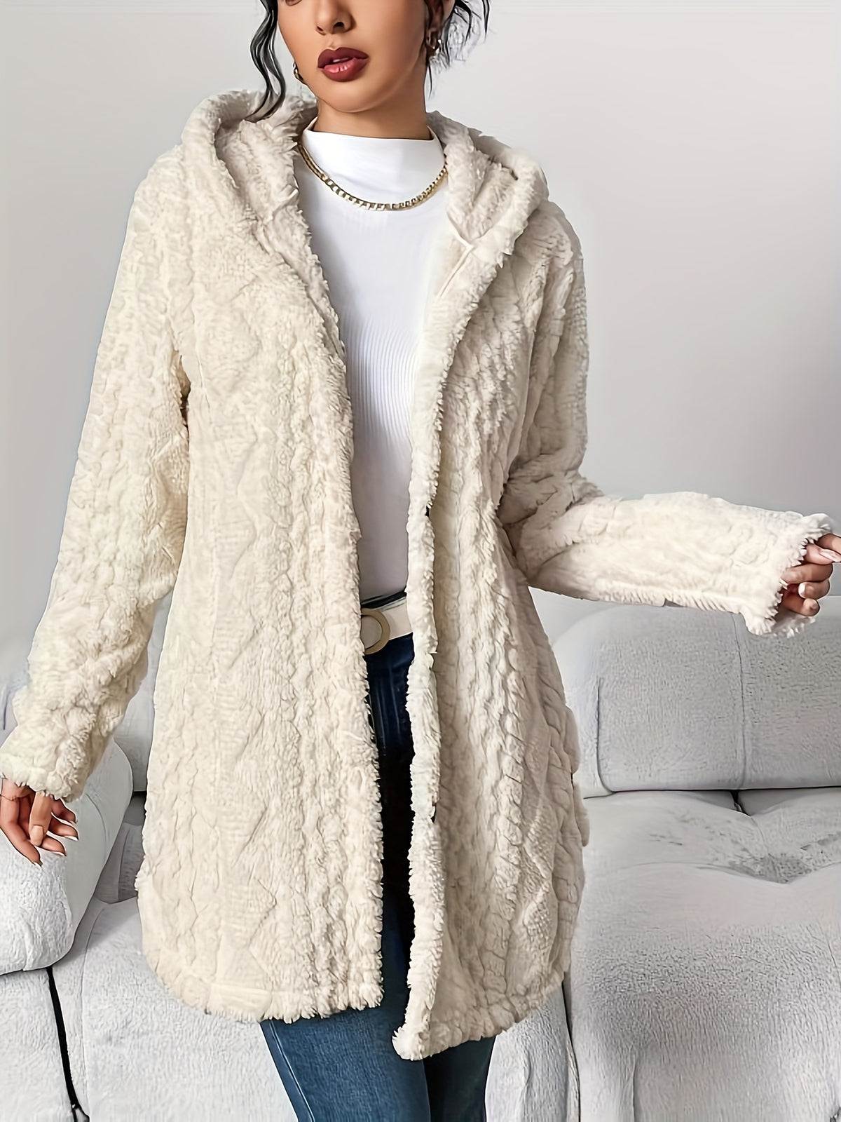 Cora plush hooded longline cardigan in cream, showing the sleeve and open front