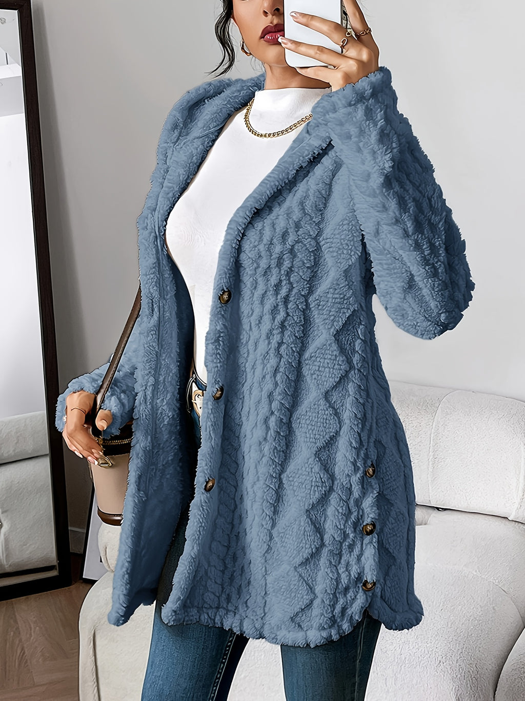 Cora plush hooded longline cardigan in denim blue, worn open over a white top