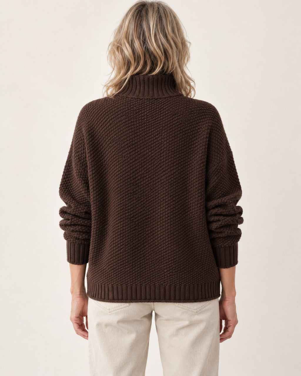 Dorothy knitted sweater in brown, back view on model