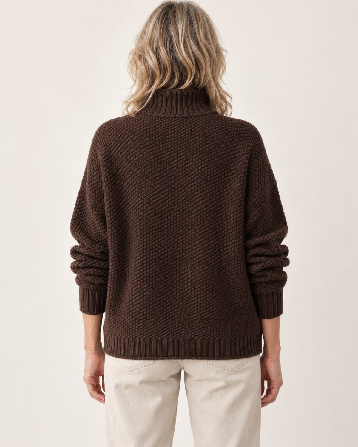 Dorothy knitted sweater in brown, back view on model