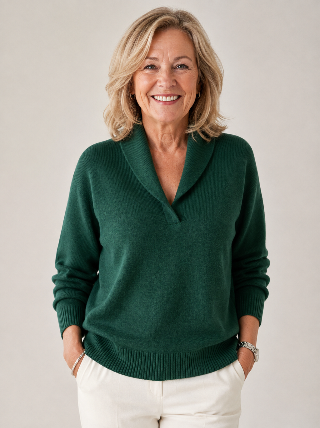 Woman wearing the Harriet shawl collar V-neck sweater in Forest Green