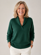 Woman wearing the Harriet shawl collar V-neck sweater in Forest Green