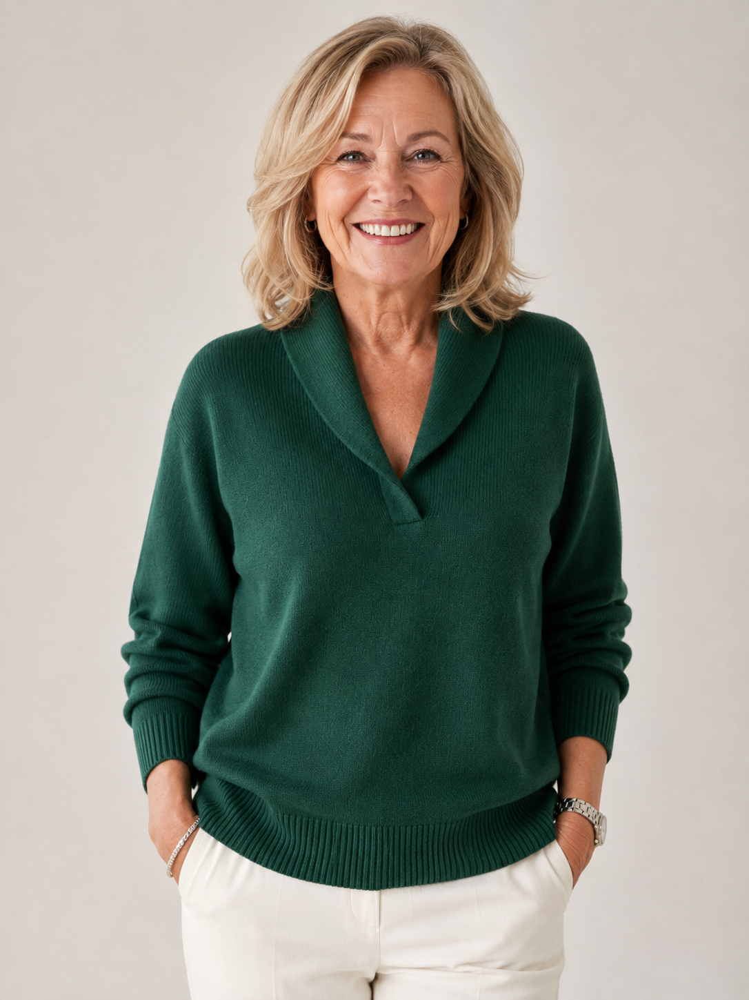 Woman wearing the Harriet shawl collar V-neck sweater in Forest Green
