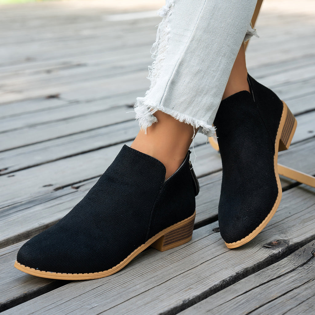 Marlowe comfort low-heel ankle boots in black, worn with cropped jeans, front view showing the V-cut ankle