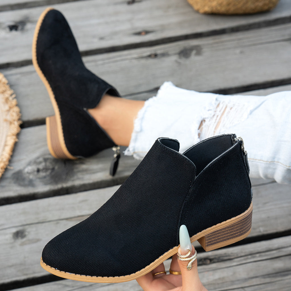 Marlowe comfort low-heel ankle boot in black, showing the V-cut ankle, back zip and low stacked heel