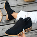 Marlowe comfort low-heel ankle boot in black, showing the V-cut ankle, back zip and low stacked heel
