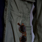 Close-up of the drawcord waist and lower flap pocket on the Mason field jacket