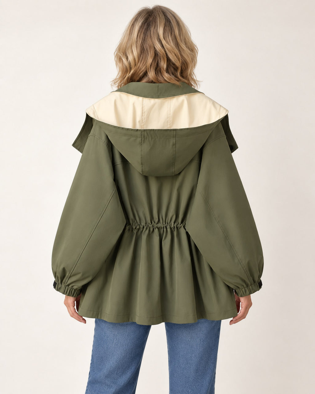 Nancy windbreaker jacket in olive green, back view on model