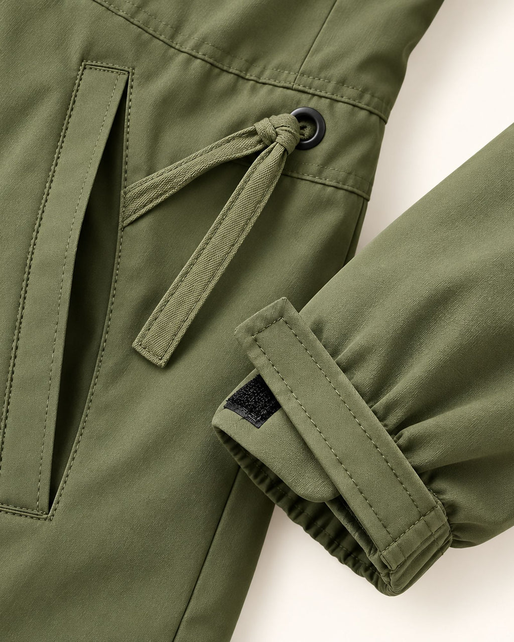 Nancy olive green windbreaker, pocket, drawcord and cuff detail