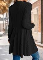 Back view of the Nora comfort knit open front cardigan in black, showing the waist seam and flared tunic length