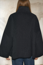 Back view of the Olivia blanket stitch boxy jacket in Dark Grey