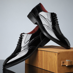 Reginald classic wingtip brogues in Black and White