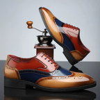 Reginald wingtip brogues in Tan Multi seen from the side and above