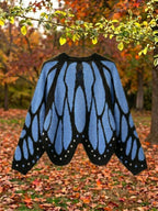 Vivienne butterfly wing cape cardigan in blue, full wingspan laid open