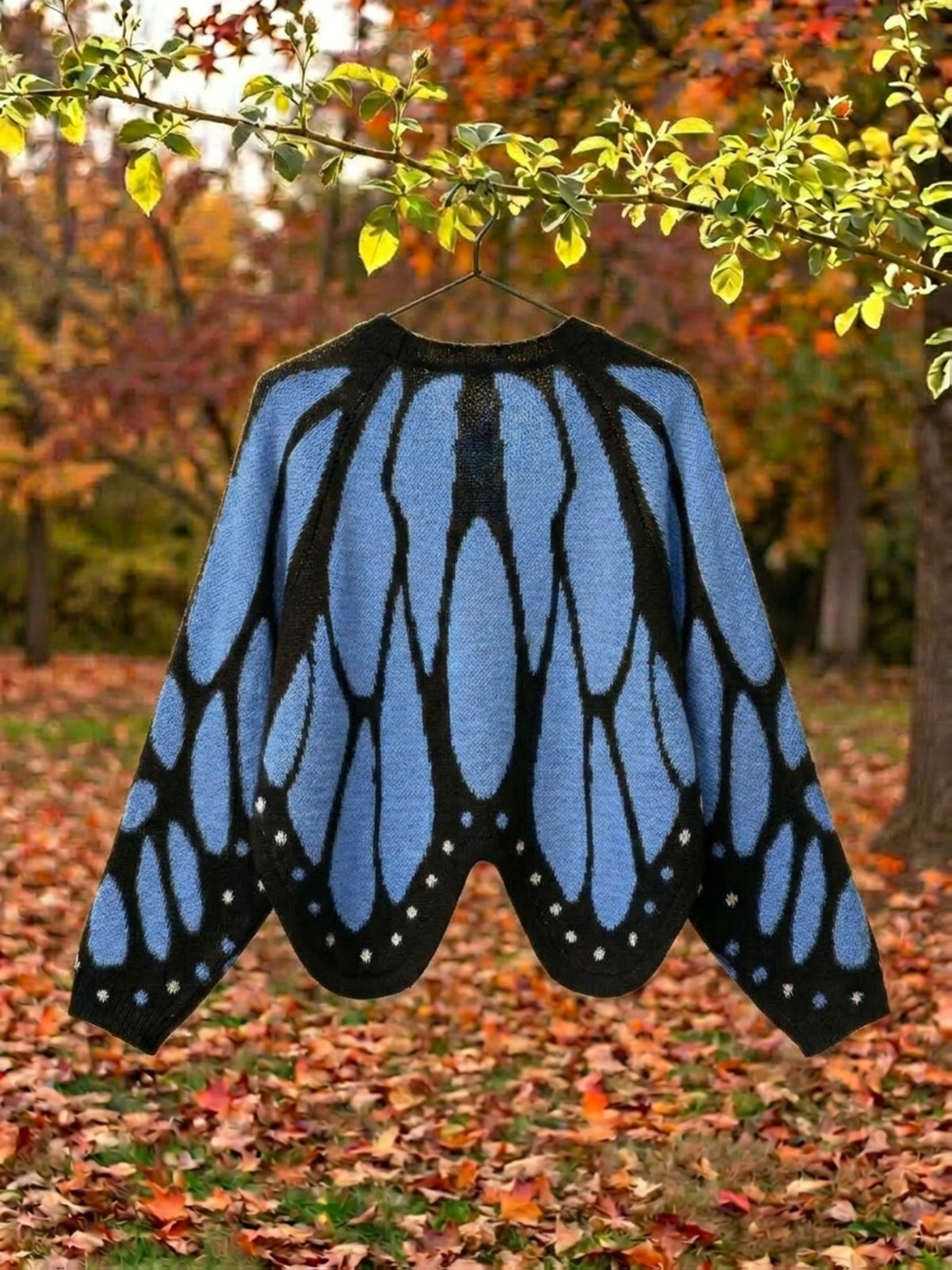 Vivienne butterfly wing cape cardigan in blue, full wingspan laid open